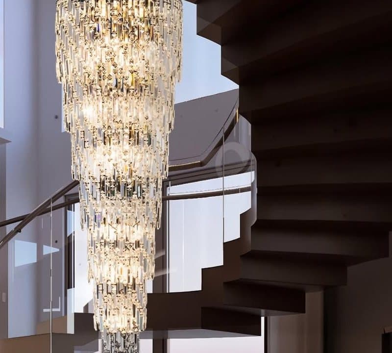 Tiered crystal chandelier in a stairwell