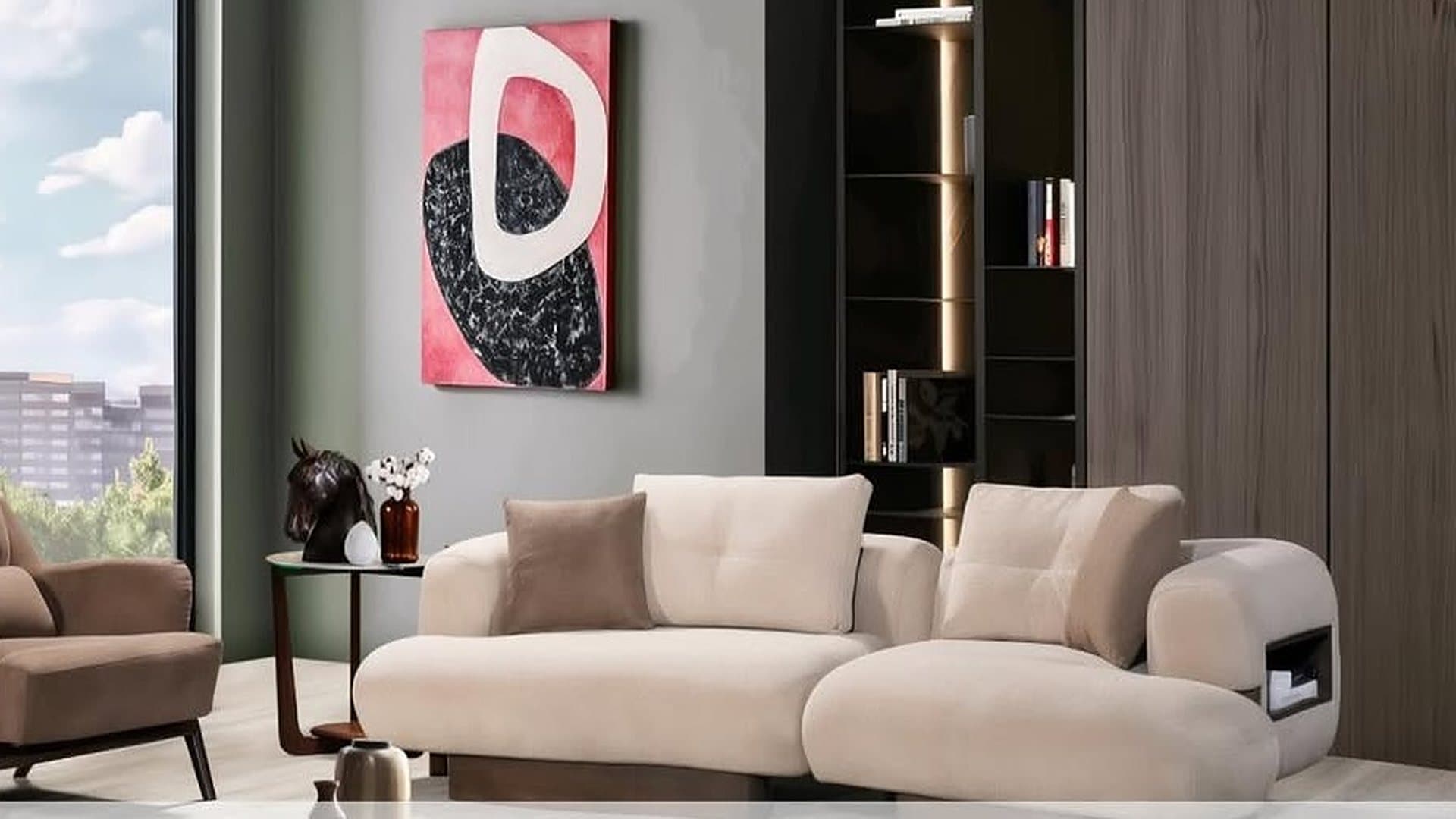 Living room with cream sofas and abstract art